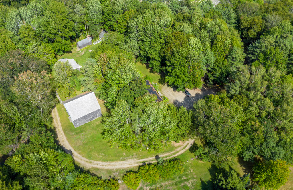 An aerial view of the grounds which are beautifully maintained by Jackson Landscaping all year round. No simple task given that the property is shrouded in large trees, a long driveway, and many maintenance challenges. Board member Tom Jackson has been donating these services to the organization for many years.